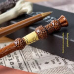 4 lapiceros con forma de varita de HARRY POTTER